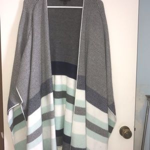 Gray w/ navy, teal striped cape/overpiece. Thick